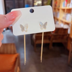 Korean version of the niche design sense White Fritillaria Bow Small Stream Sutu Earrings Female Autumn and Winter Advanced temperament Net Red Earrings