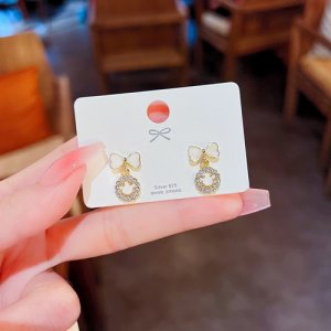 925 Silver Needle Sweet Bow Smile Face Face Platty Summer Design Sensory Earrings Fashion Simple Student Earrings